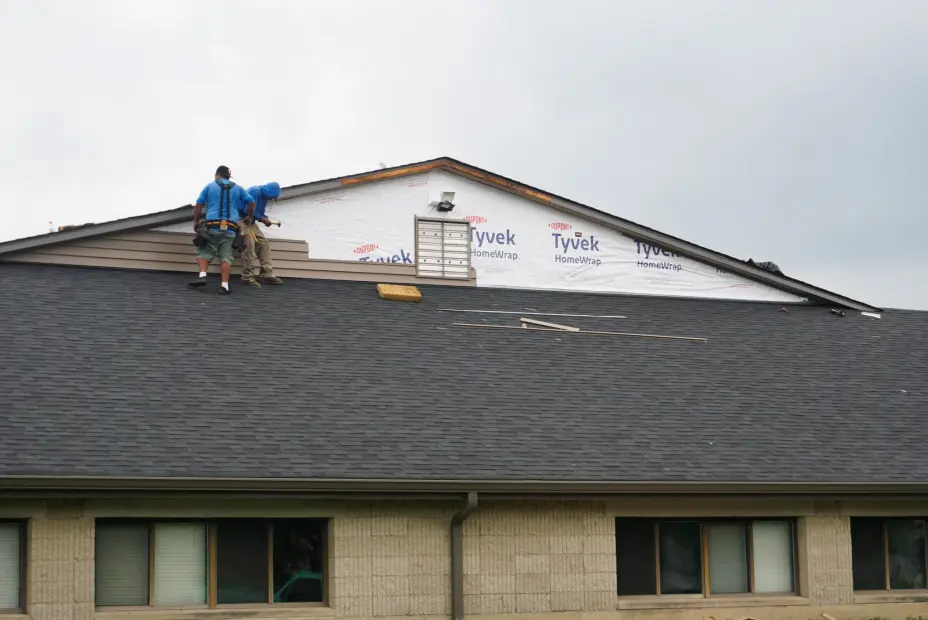 RG Roofing crew working on a roof